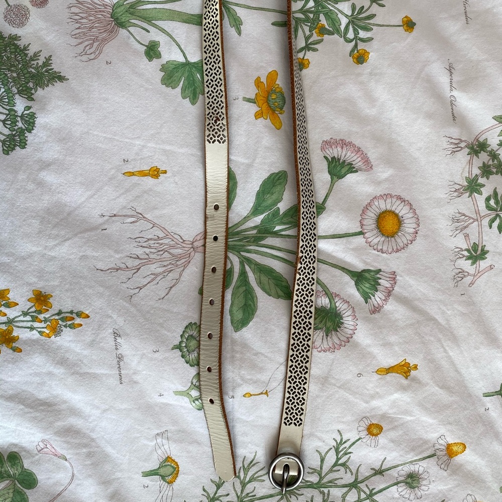 white cutout belt